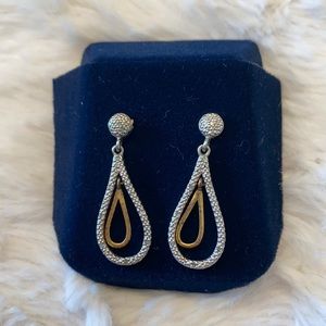 Gold and silver dangling earrings